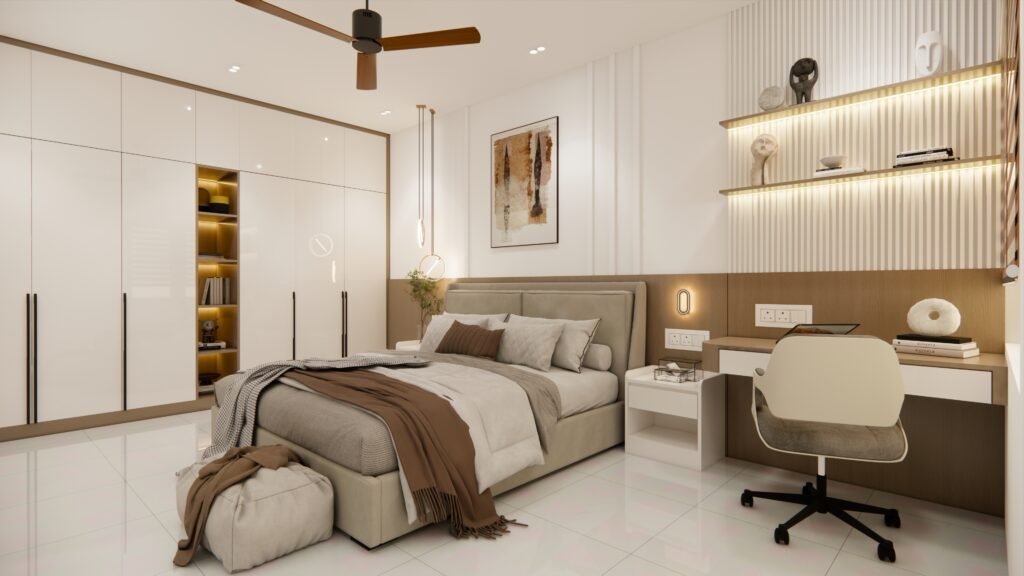 A contemporary bedroom featuring a large built-in wardrobe with white glossy doors and wood-toned shelves, a light gray upholstered bed with brown pillows and throw, a small white nightstand, and a desk with a light gray swivel chair. The walls are white with fluted paneling detail behind the bed, and the floor is glossy white tile.